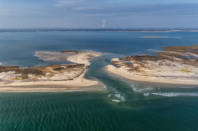 A breach from the Atlantic Ocean, through Fire Island, and into Bellport Bay.