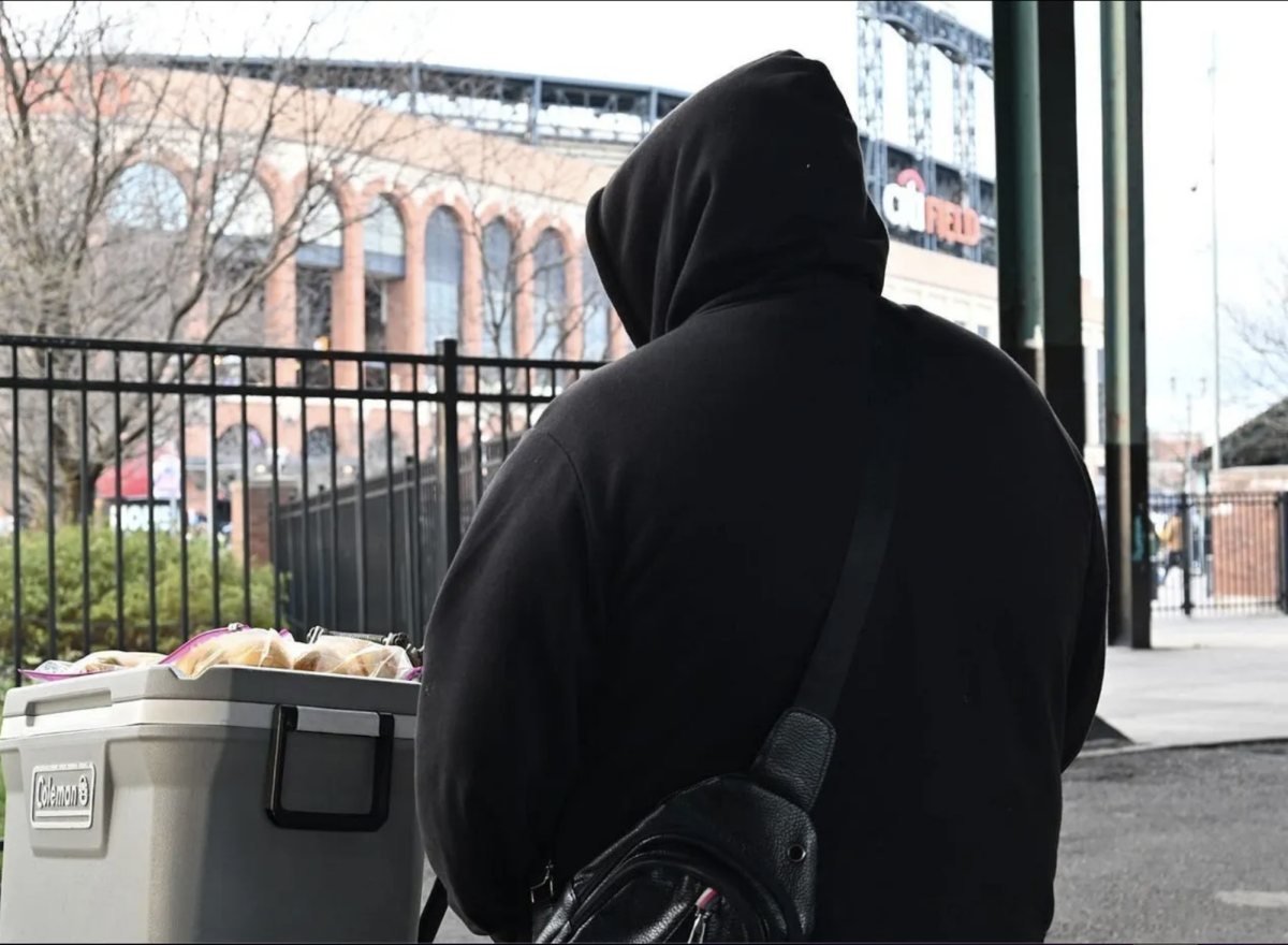 Jose, a street vendor waiting for customers before the NYCFC match against Atlanta United FC on Saturday, April 6th, 2024. Photo: Emmanuel Jaquez