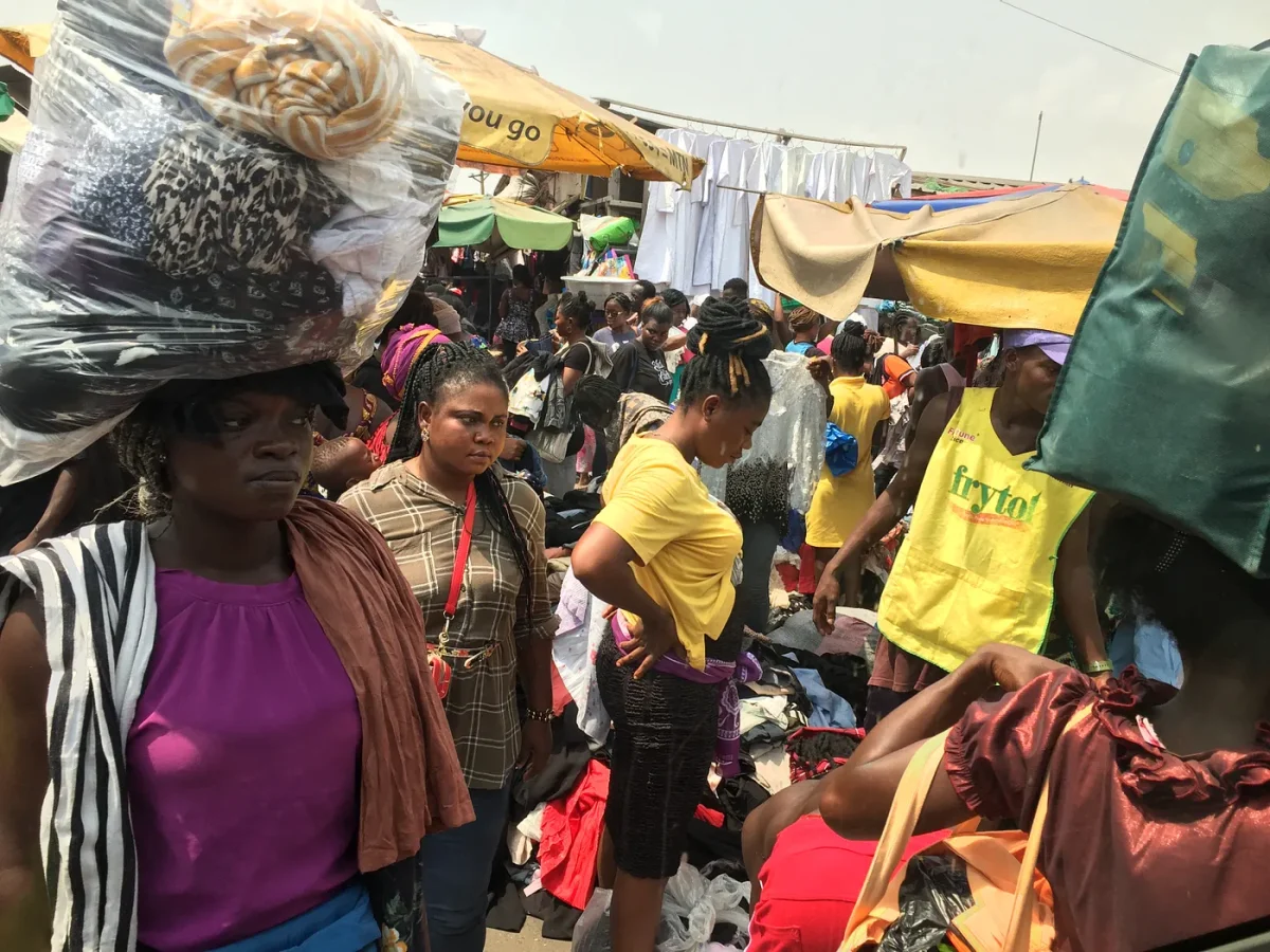 The vibrant scene at Makola market as market women engage in a trade of secondhand clothing. Photo by Doreen Abanema Abayaa.
