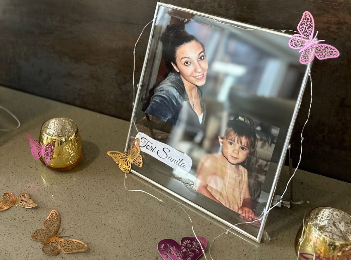 ECLI-VIBES memorial of Tori Sanita, along with her baby photo.